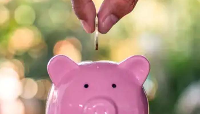 A professional HVAC technician inspecting an air conditioning unit, representing the decision-making process behind the HVAC $5000 rule.